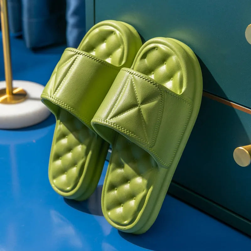 A pair of soft EVA bathroom slippers with a non-slip sole, shown in a selected colour.