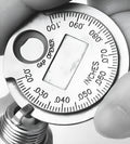 Round zinc alloy spark plug gauge with dual metric and inch scales