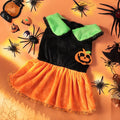 Pet dog wearing a classic orange pumpkin skirt Halloween costume made from Crystal Velvet fabric.