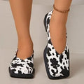 Women's cow pattern flat shoes with wedge heel in black and white, first layer cowhide upper
