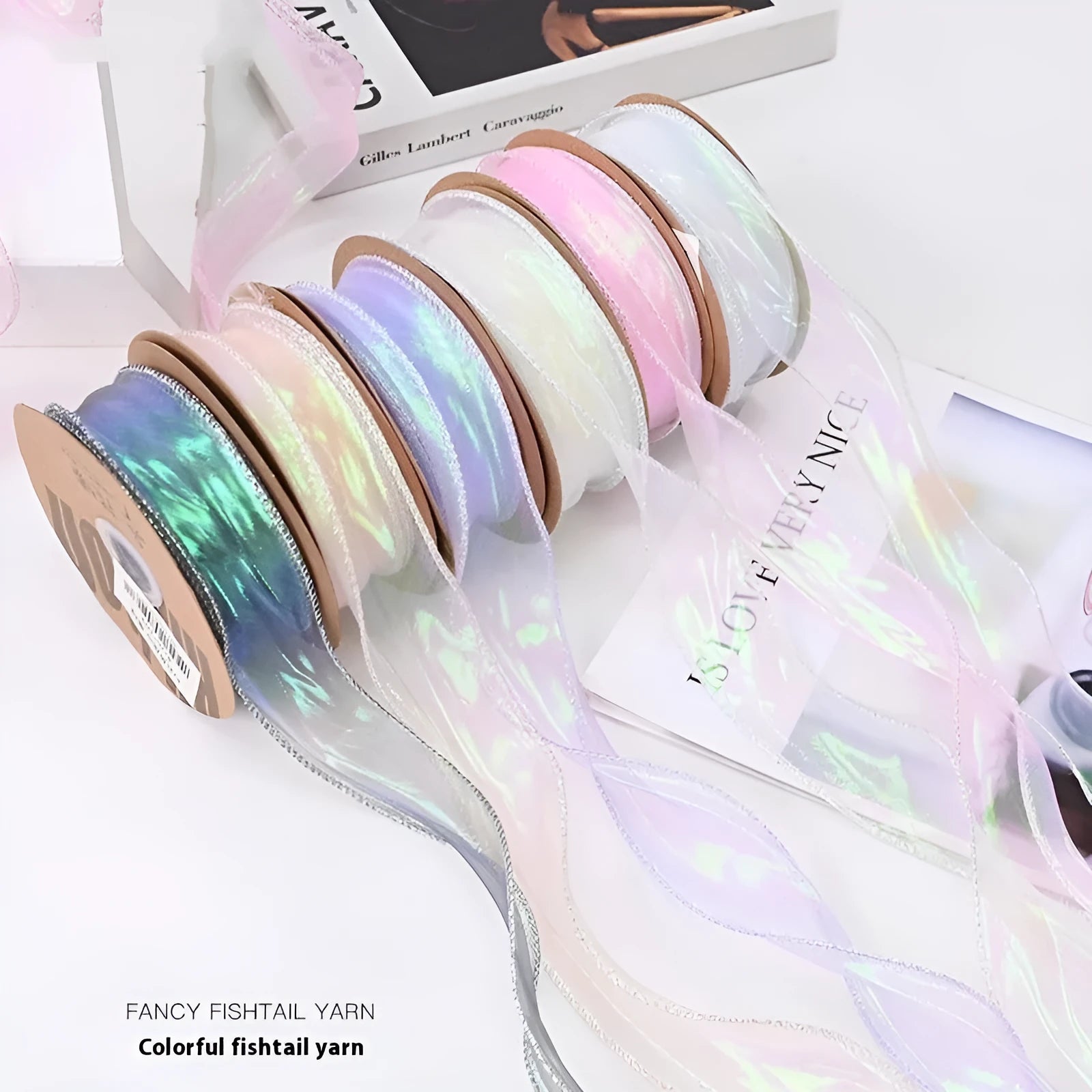 Fishtail yarn ribbon with wave-like mesh edges in multiple colour options for craft projects