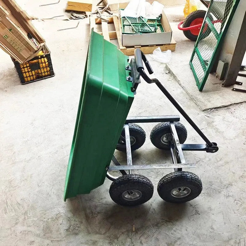 Green four-wheel plastic dump truck with steel PP construction and a tilting cargo bed.
