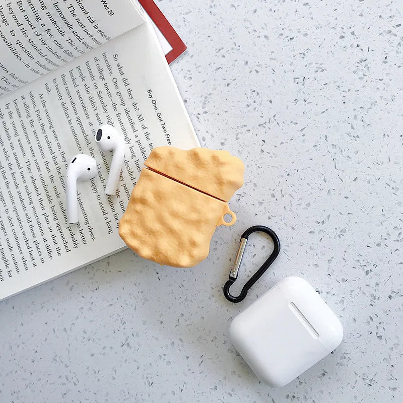 Green silicone protective case for AirPods 1 and 2 with a cartoon animal design on the front.