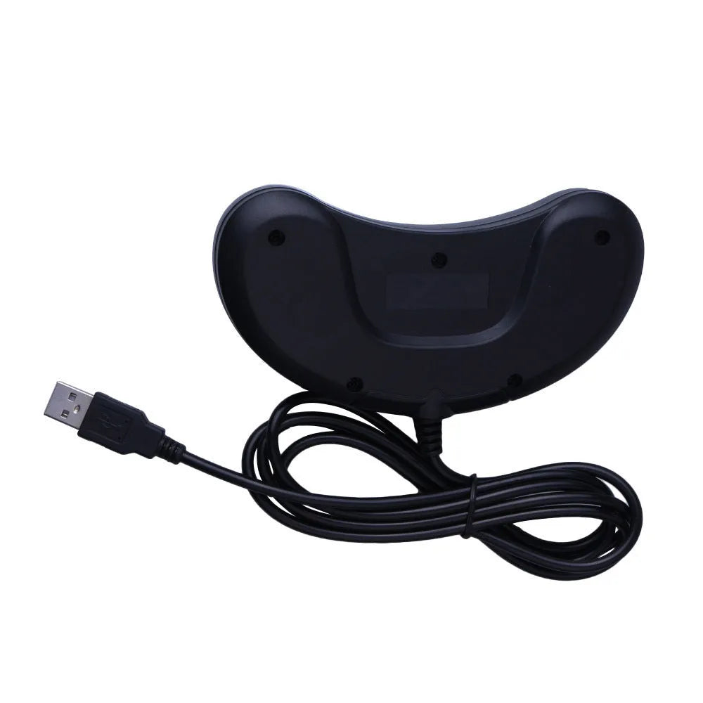 Black Sega USB PC game controller with 1.8 metre cable on desk