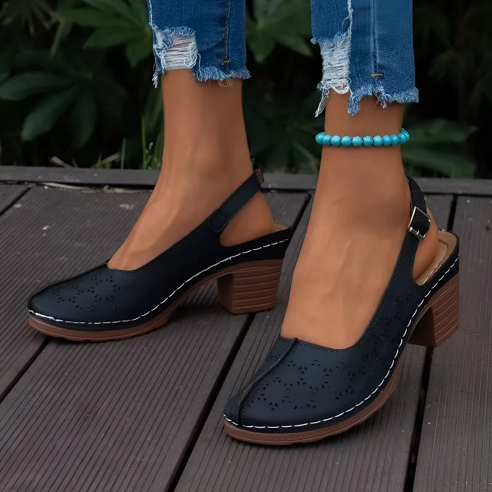 Women's closed toe wedge sandals in black with round toe and rubber sole