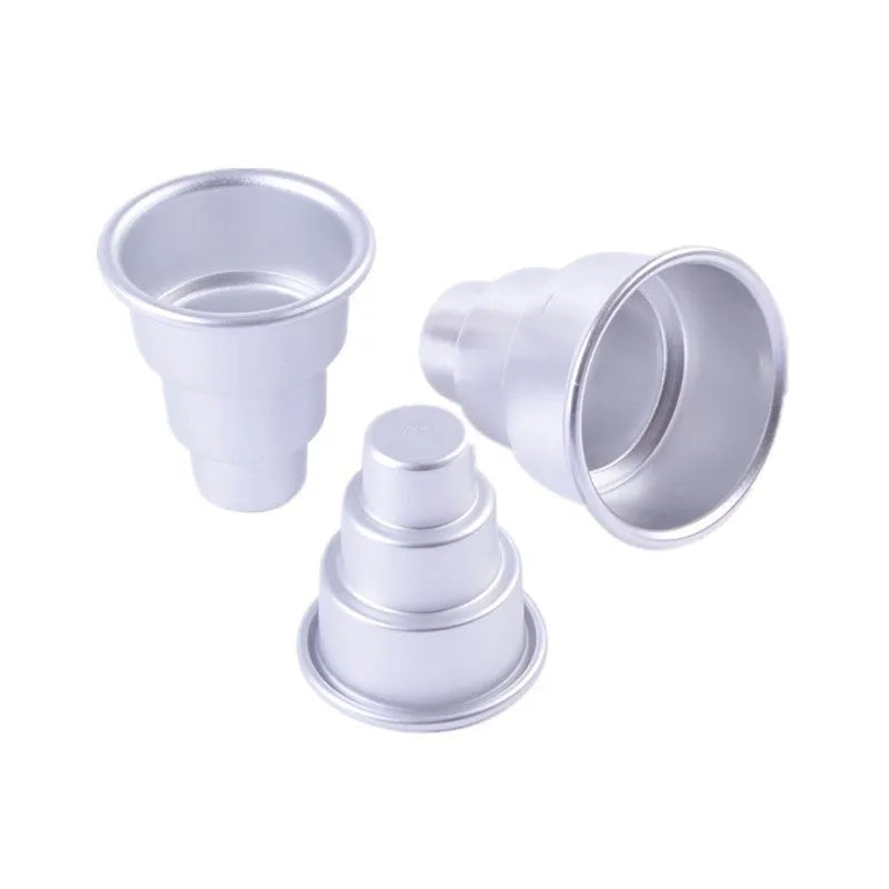 Set of three silver aluminium alloy cake moulds in large, medium, and small sizes for layered desserts.