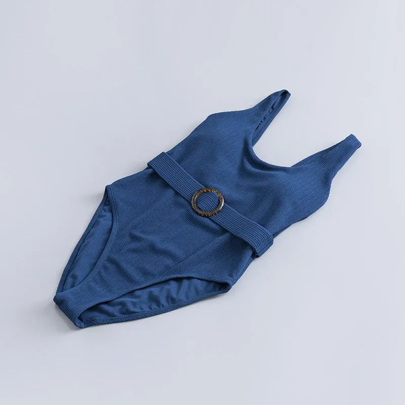 Navy blue women's one-piece swimsuit with triangle slimming shape and removable chest pads