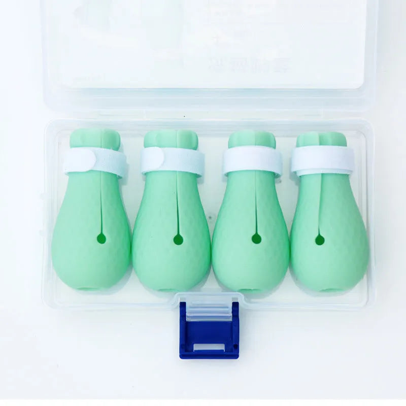 Transparent green silicone cat anti-scratch foot covers showing four protective gloves for pet handling