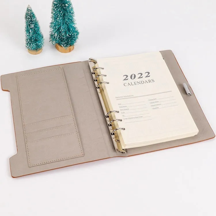 A5 white loose-leaf notebook inner pages with monthly plan layout on paper