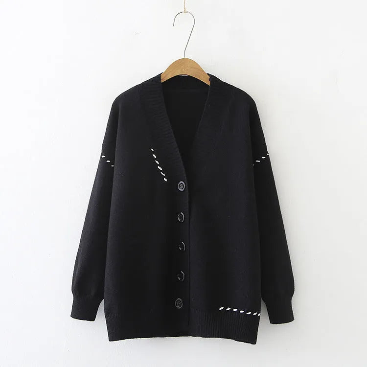 Women's loose fit long sleeve knitted cardigan coat in black or white