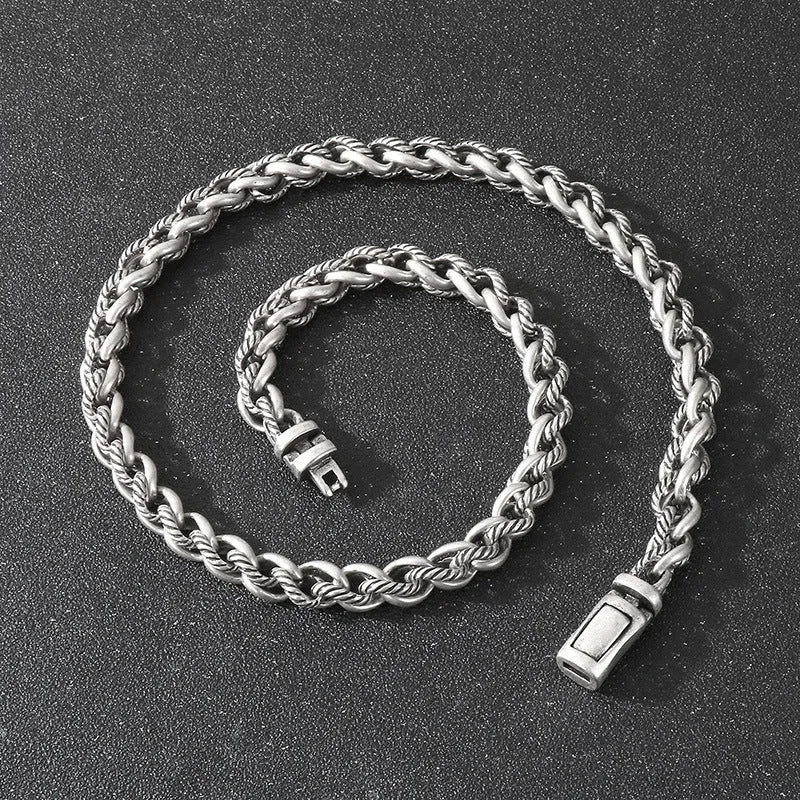 Men's keel chain titanium steel necklace in antique silver finish showing geometric design details