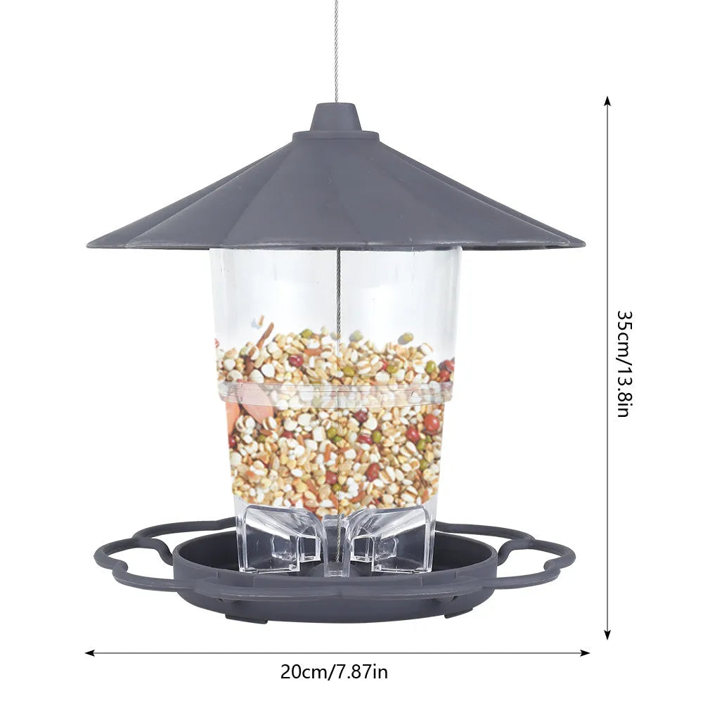 Collapsible wild birds feeder hanging birdcage with removable roof and large capacity bowls in outdoor garden setting