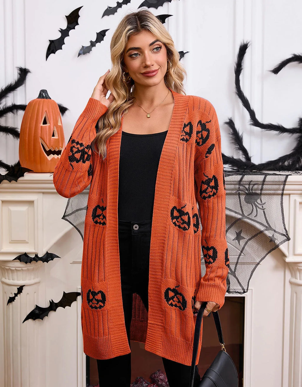 Women's black Halloween cardigan with orange pumpkin head jacquard pattern, medium length straight cut
