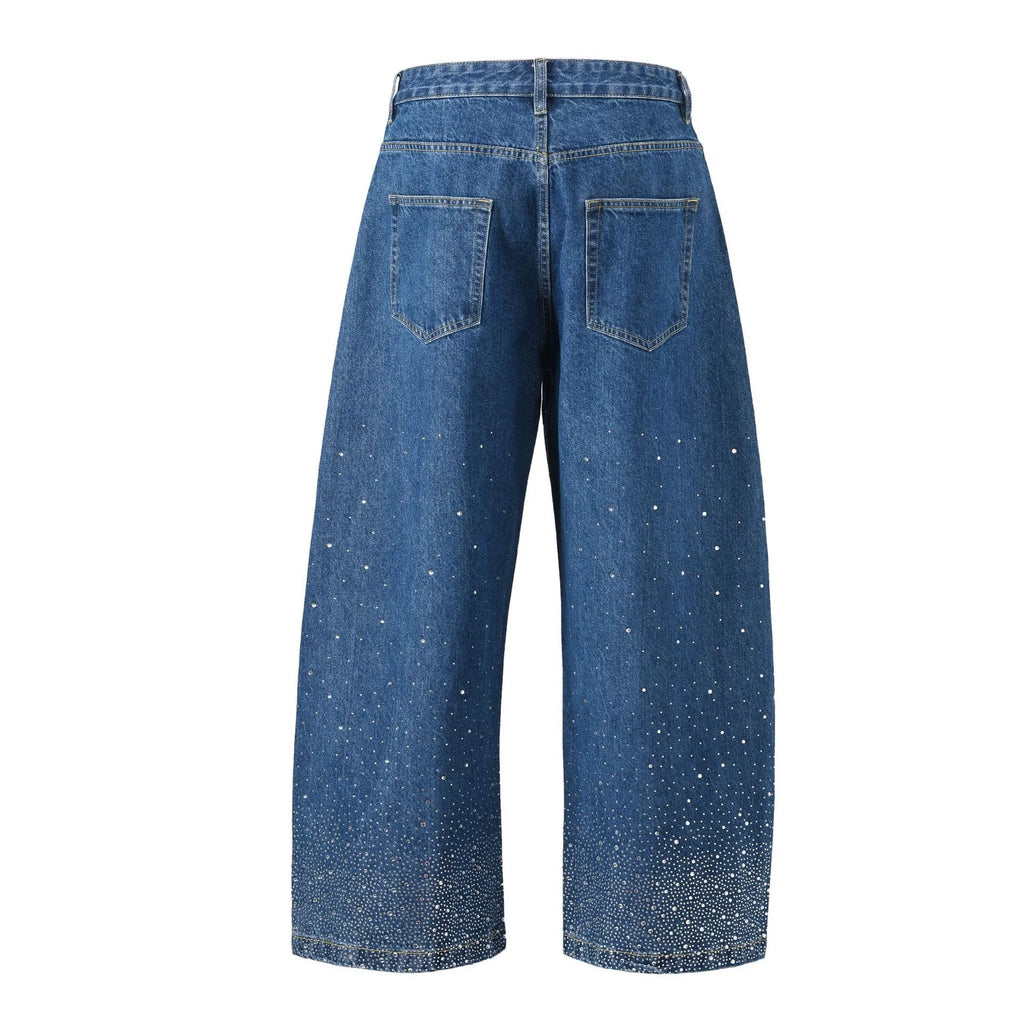 A pair of loose-fitting, wide-leg cotton trousers in a European and American high street style, shown in blue.