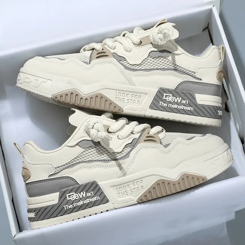 Men's low top white casual shoes with rubber sole and mesh lining in beige, black, or white and yellow.