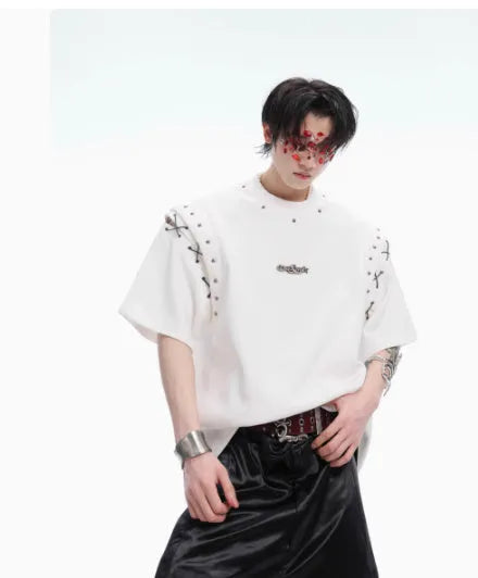 Black deconstructed lace-up short sleeve t-shirt with front cutout detail on a mannequin.