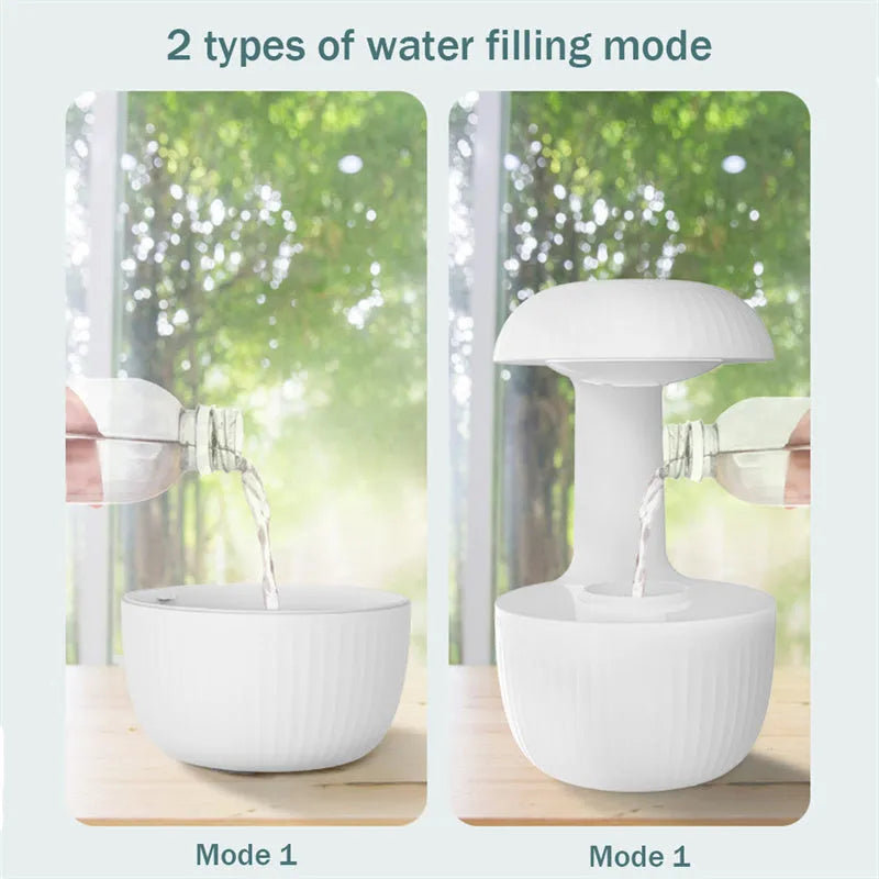 White anti-gravity air humidifier with levitating water drops and USB cable on a desk