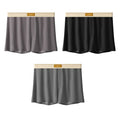 Men's solid colour ice silk loose fit boxer shorts on a white background.