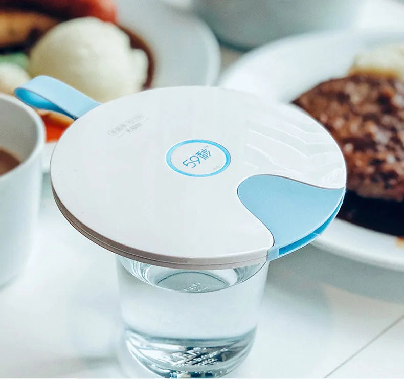 A slim, portable UV-C baby bottle steriliser in blue, showing its compact size and USB port.