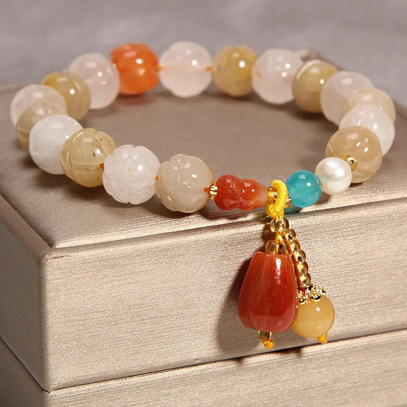 Yellow agate crystal bracelet with gold silk thread and adjustable sliding knot closure