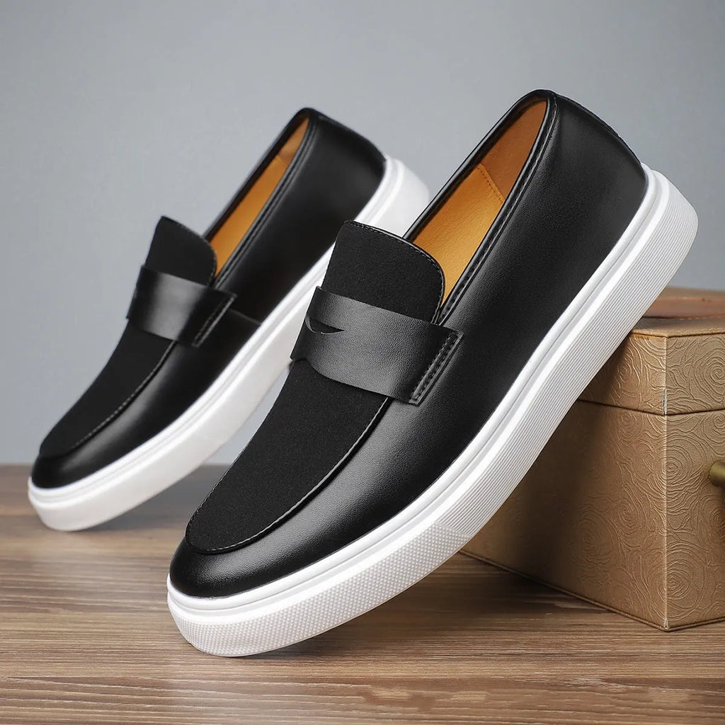 Men's slip-on gommino British style casual shoes in black with tassel detail, mid heel, and round toe