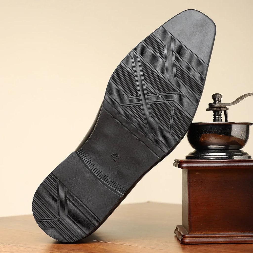 Brown men's formal shoes with square toe, side zipper, and low square heel on a rubber sole.