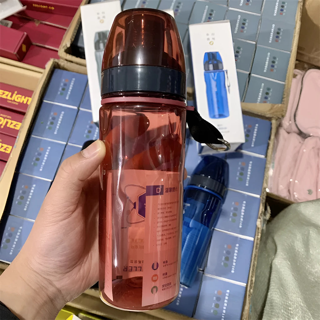 Blue portable sports water cup with a separate compartment for loose-leaf tea.
