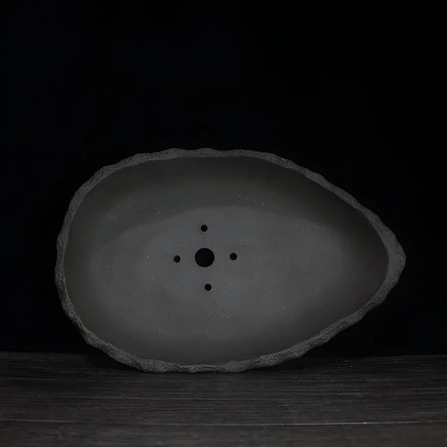 Handmade purple clay flower pot showing colour options and drainage hole styles