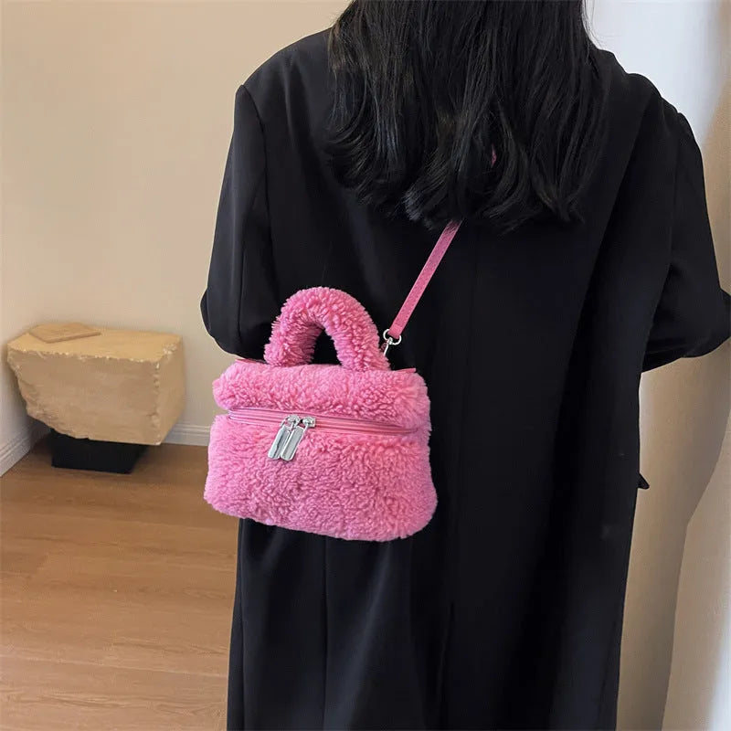 Soft plush women's shoulder bag in cream white, box shape with visible stitching and zipper pocket, street-trend style
