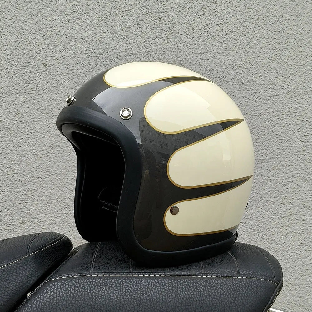 Retro style fibreglass half motorcycle helmet shown in a choice of colours like cement grey and matte black.