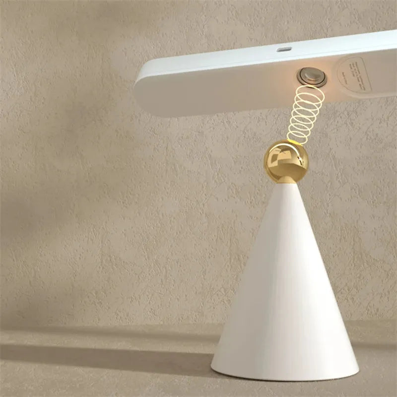 Geometric magnetic table lamp with PC shade in khaki or white featuring touch control and USB power for wall or desk use