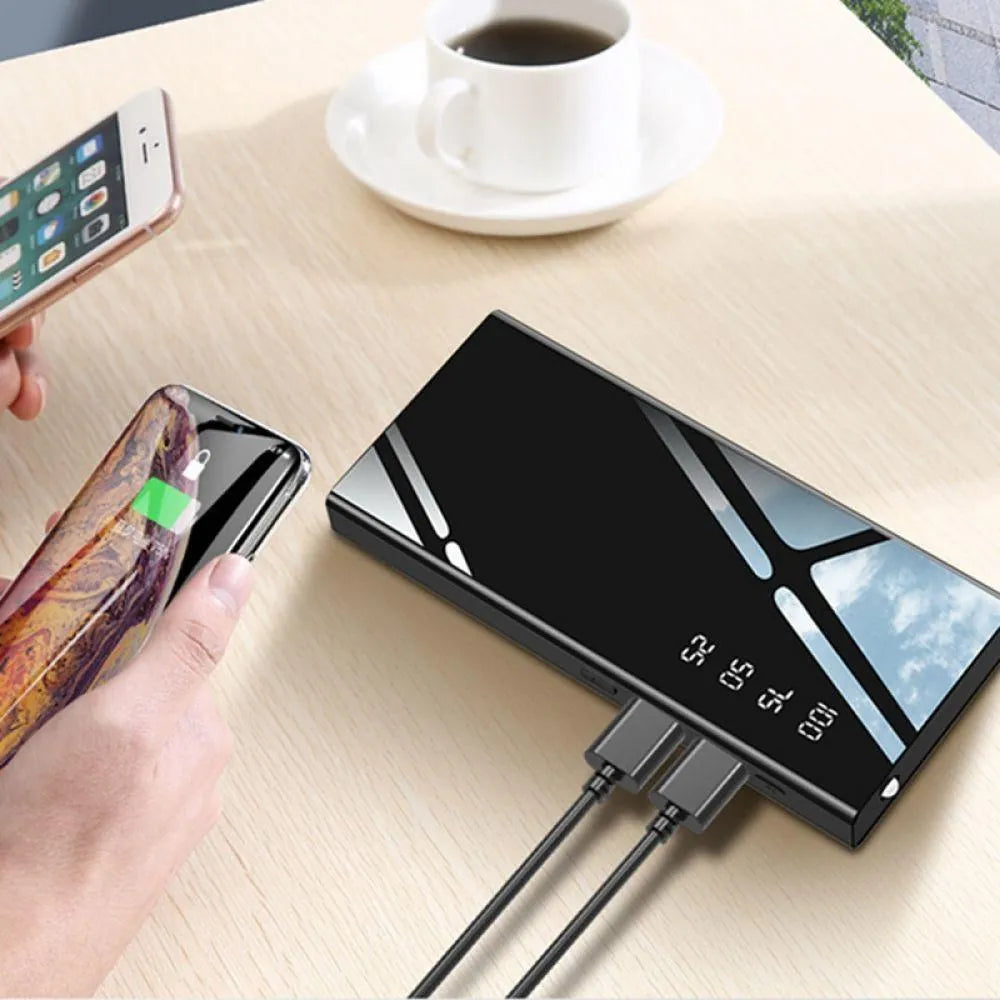 20000mAh power bank with LCD display and dual USB ports in black, red, or white colours
