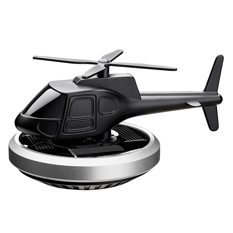 Solar-powered metal helicopter car perfume ornament rotating on dashboard