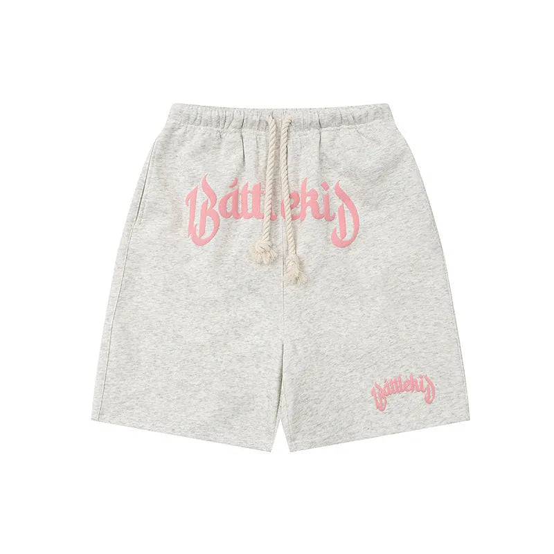 Cotton-blended cropped sweatpants in loose street style, shown in black colour.