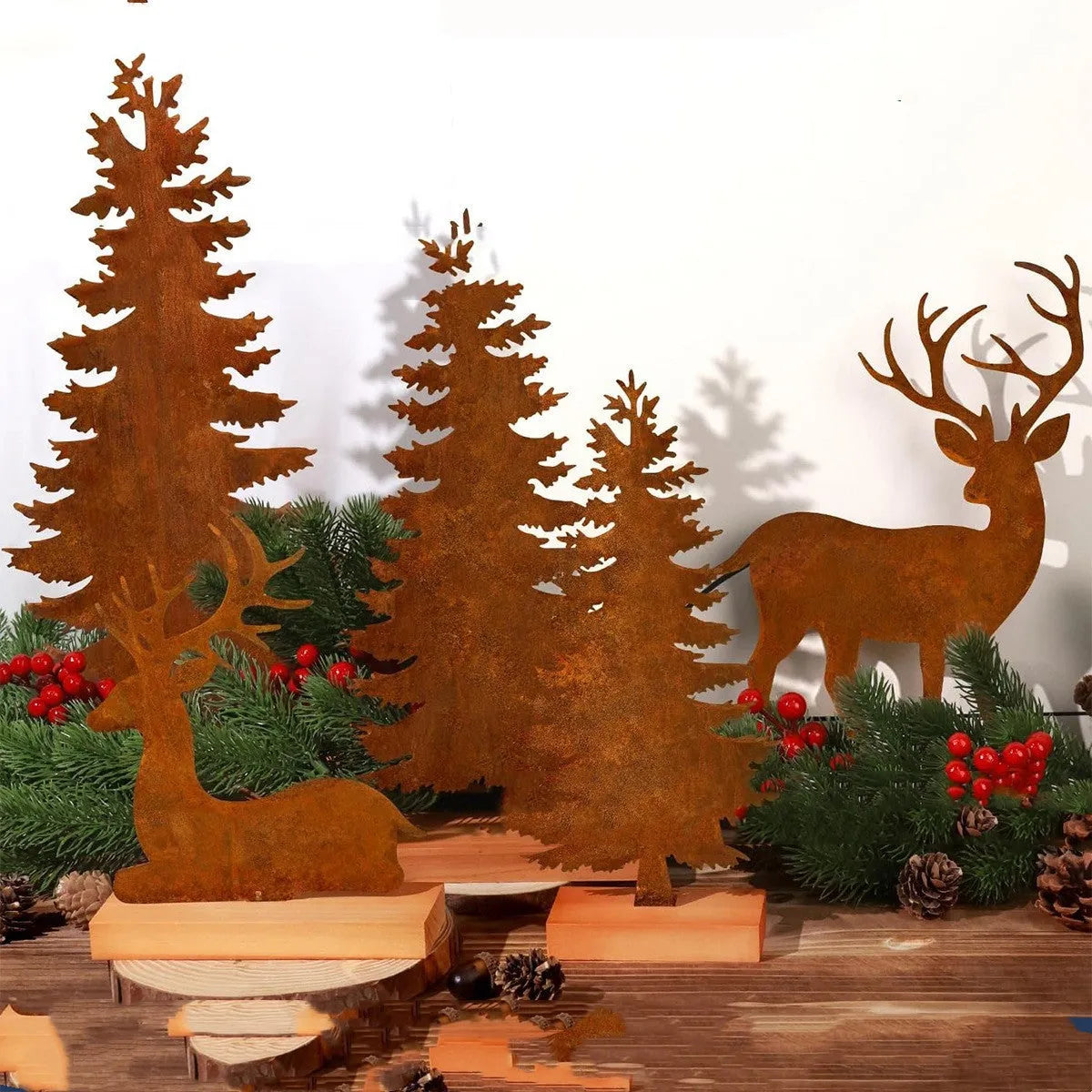 Set of three rustic metal Christmas tree ornaments with integrated elk designs, iron construction, antiqued finish.