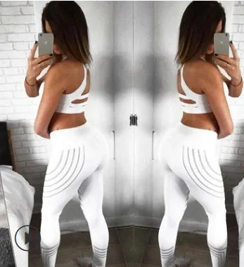 Women's black glow-in-the-dark fitness leggings with reflective print in pencil pants style