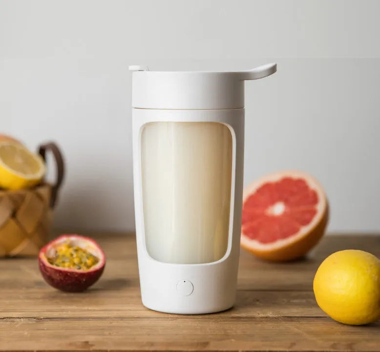 Portable rechargeable blender cup in blue, showing its 650ml capacity and compact design.