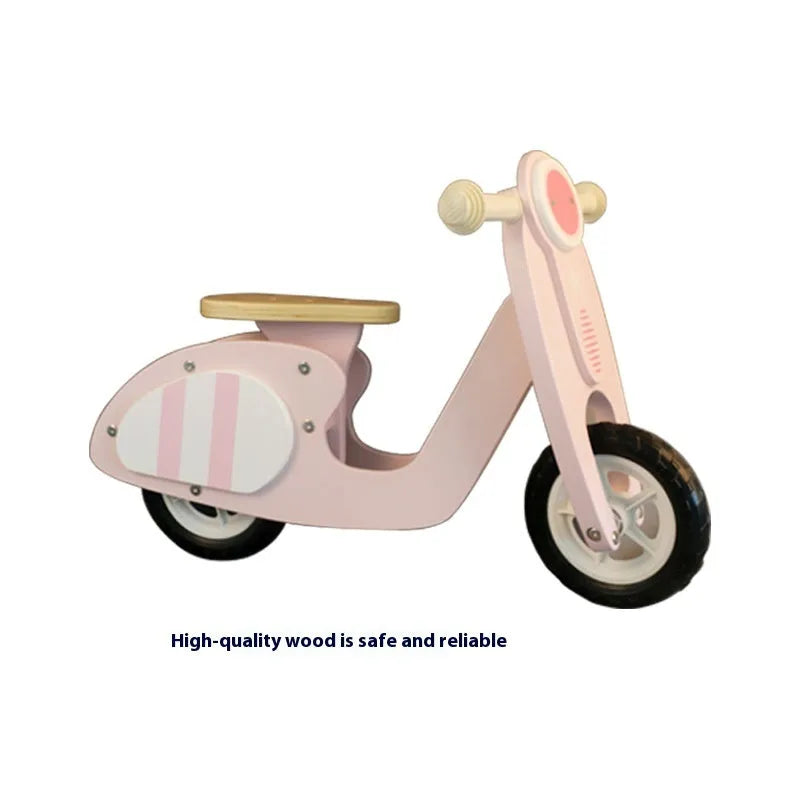 Pink wooden toddler balance scooter on wheels for children aged 1-6 years.