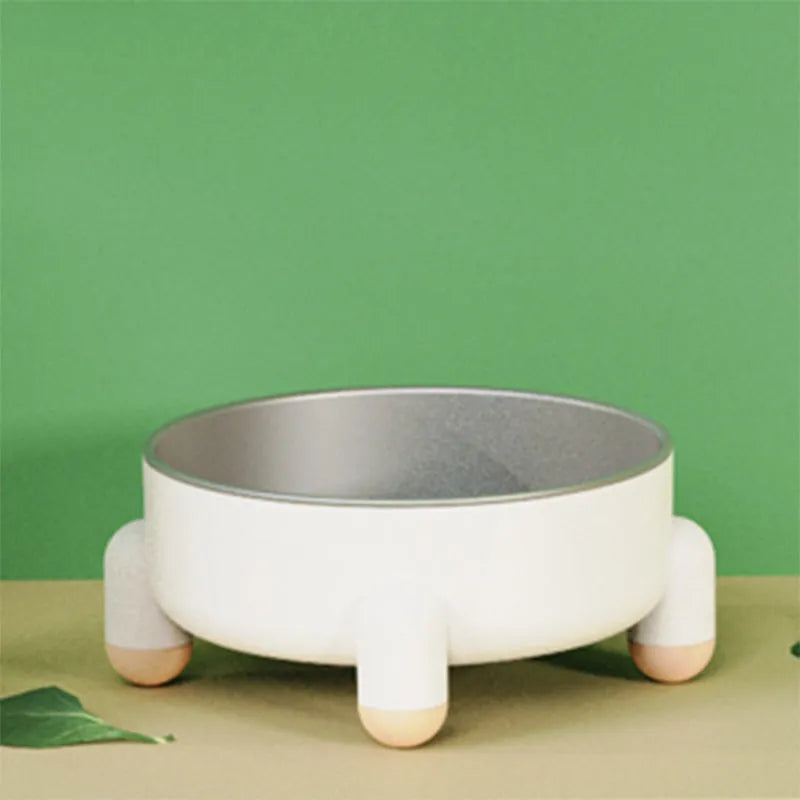 Stainless steel pet bowl with non-slip base and high foot in green, pink, and white colour options