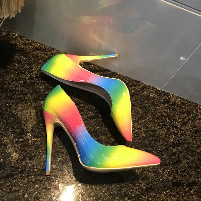 Rainbow multicolour patent leather women's stiletto heels with pointed toe on a white background