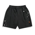 Men's black loose-fit casual shorts with a semi-elastic waistband, colour button, and zipper fly.