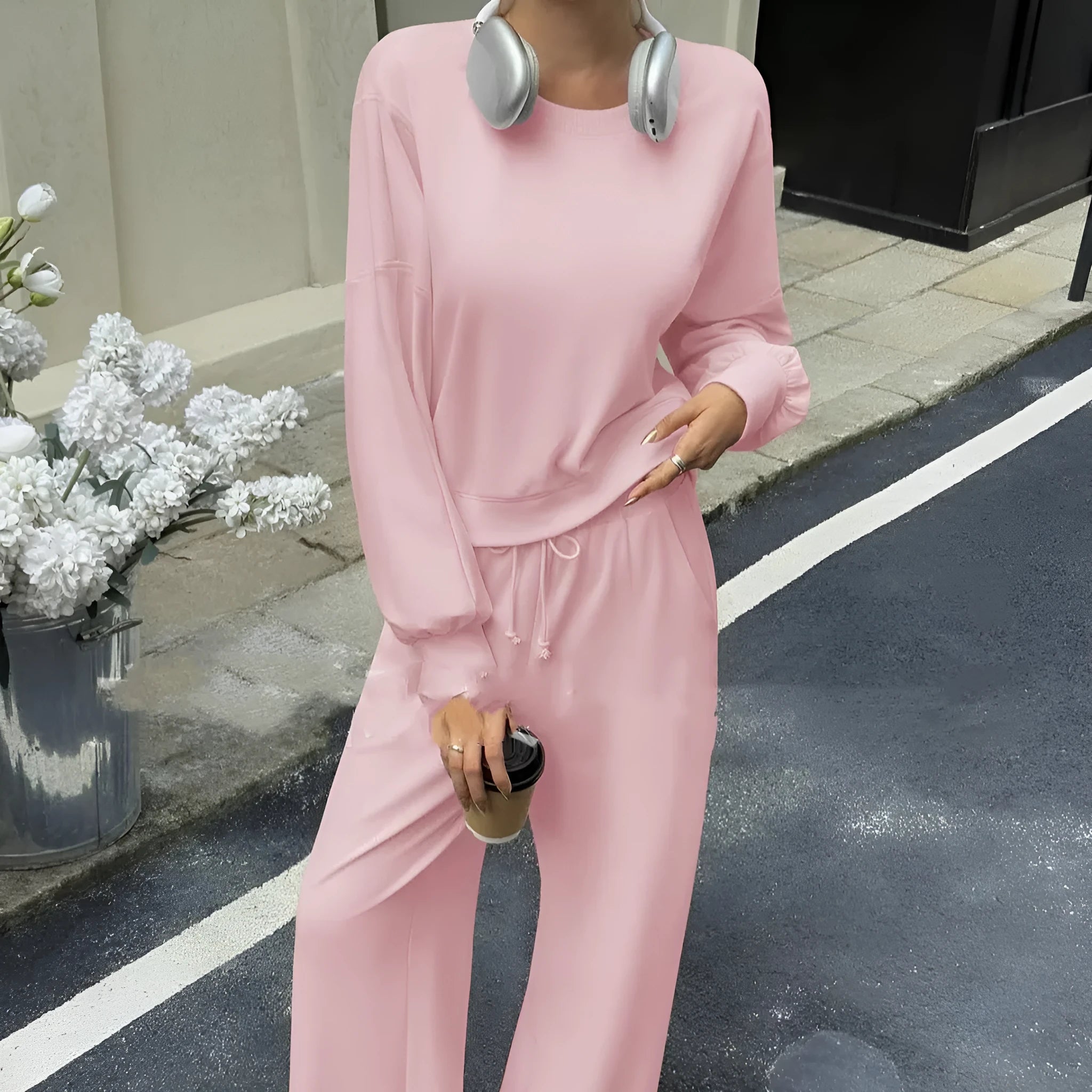Women's solid colour polyester trousers two-piece set showing long sleeves top and matching trousers