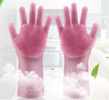 A pair of blue silicone cleaning gloves with a textured sponge-like surface for scrubbing.