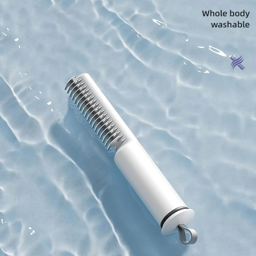 Stainless steel pet dematting comb with handle for removing knots and mats from dog's coat.
