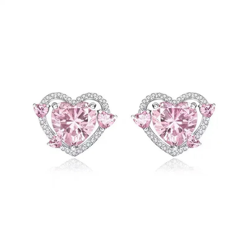 A pair of heart-shaped stud earrings with a white gold colour finish.