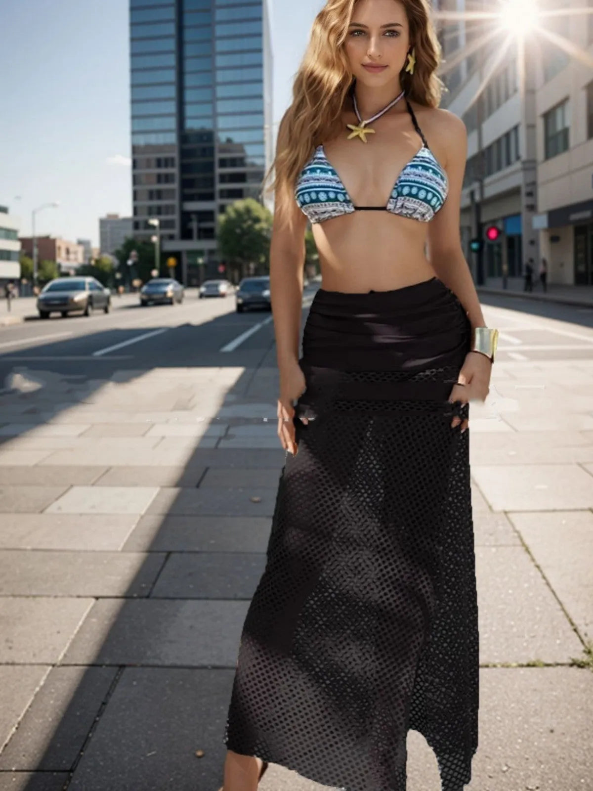 Women's brown gradient fishnet long skirt and bikini three-piece swimwear set on a mannequin.