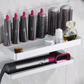 White double-layer aluminium bathroom storage rack holding hair curlers with punch-free installation
