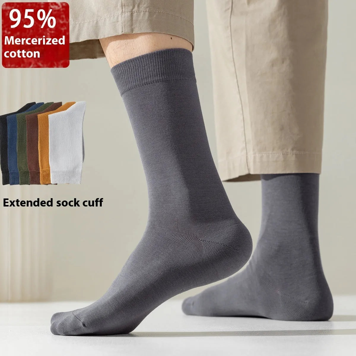Men's solid colour mid-calf socks in combed cotton, shown in a range of neutral shades including beige, black, and dark blue.