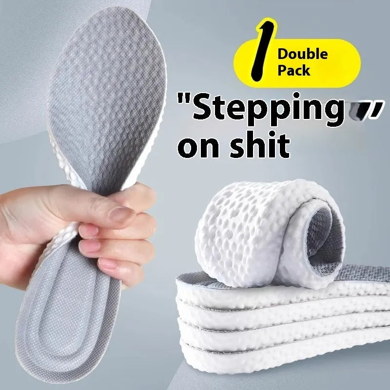 Breathable grey, black, and orange PU foam sports insoles with cut-to-fit sizing lines.