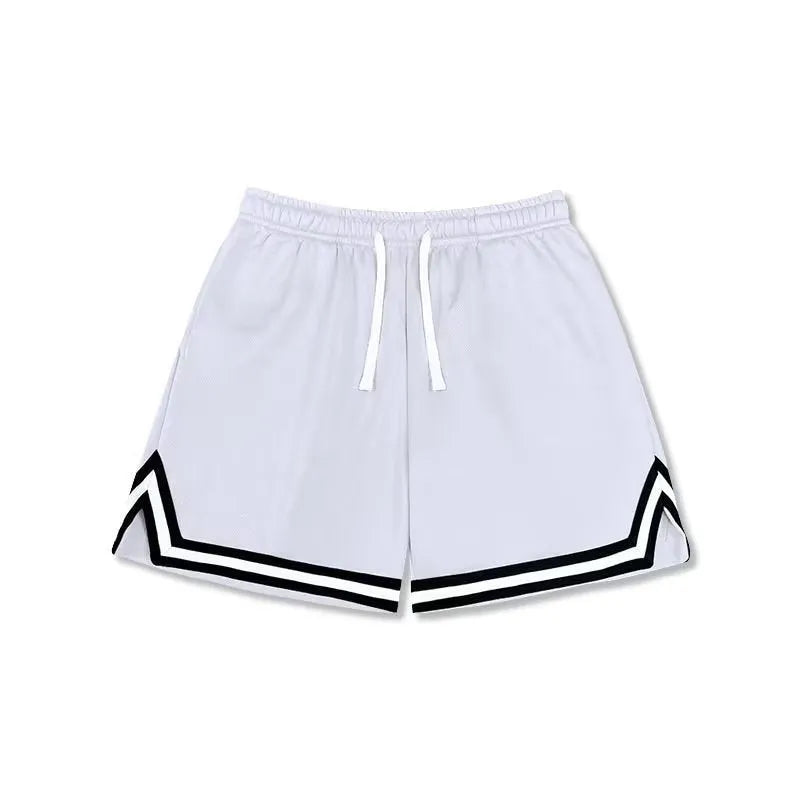 Men's loose blue sports shorts made from polyester fabric on a plain background.